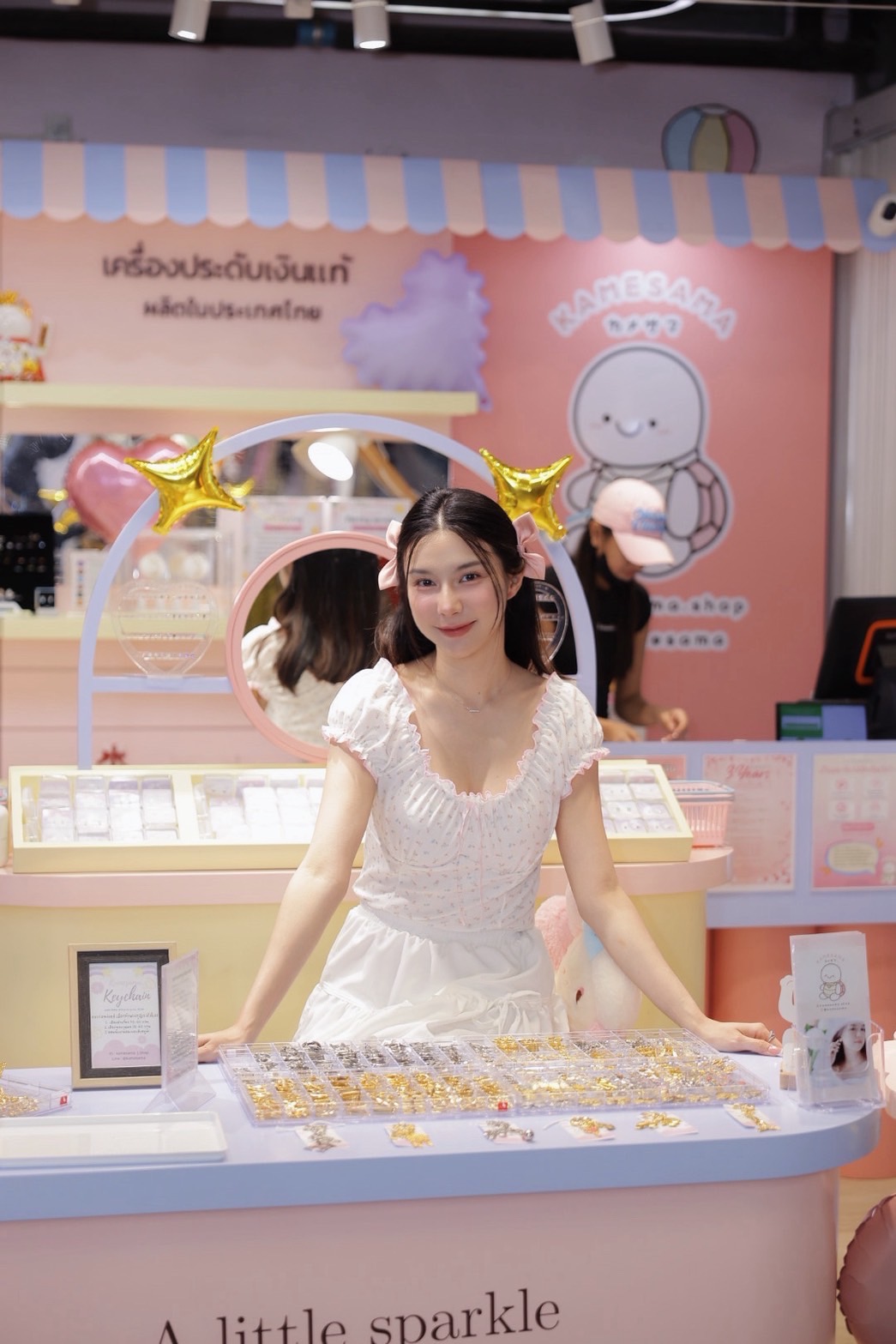 Kamesama shop staff at silver jewelry counter